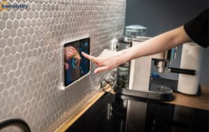 A person controlling smart home technology devices using a smartphone app at home