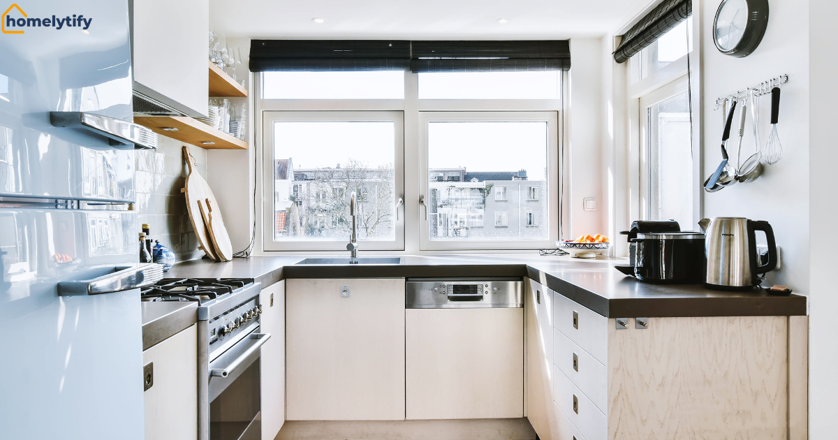 Organize a Small Kitchen with smart cabinet storage, clean countertops, stainless steel appliances, and bright natural lighting in a compact modern kitchen.