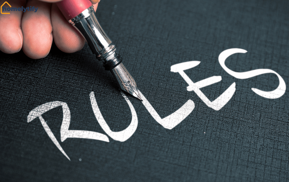 Rules for organizing your home on a budget written with a fountain pen on dark background