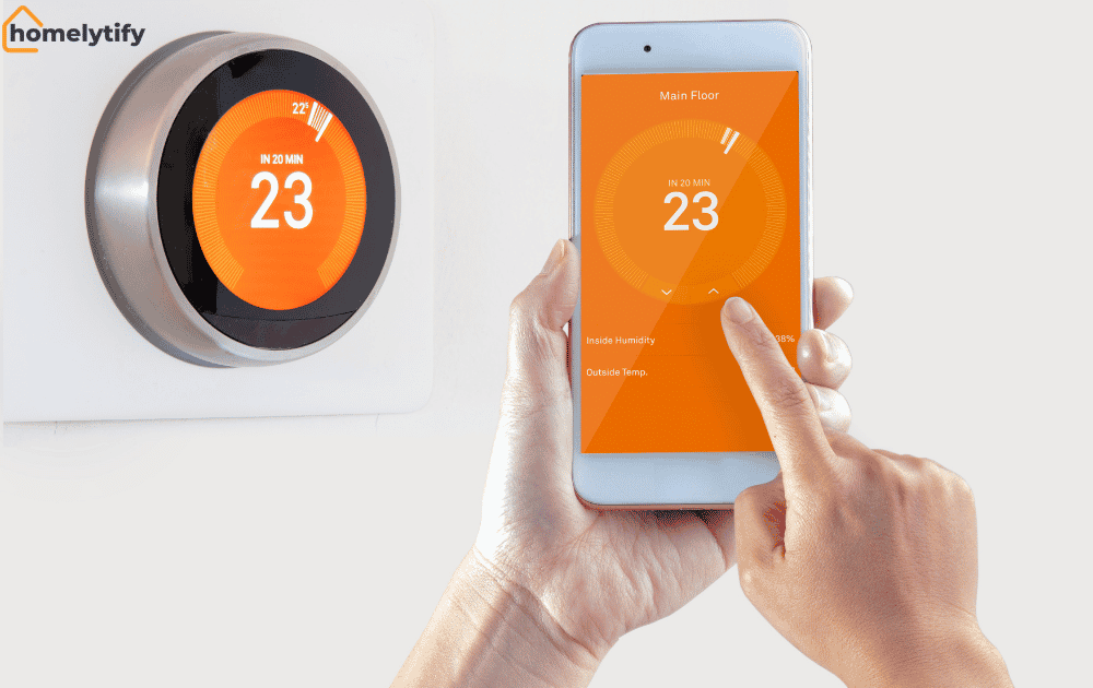 Hands controlling a smart thermostat temperature setting through a mobile app with the wall-mounted device in the background