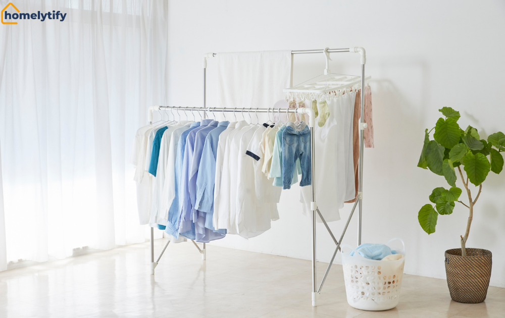 Clothes hanging on a rack indoors for air drying at home