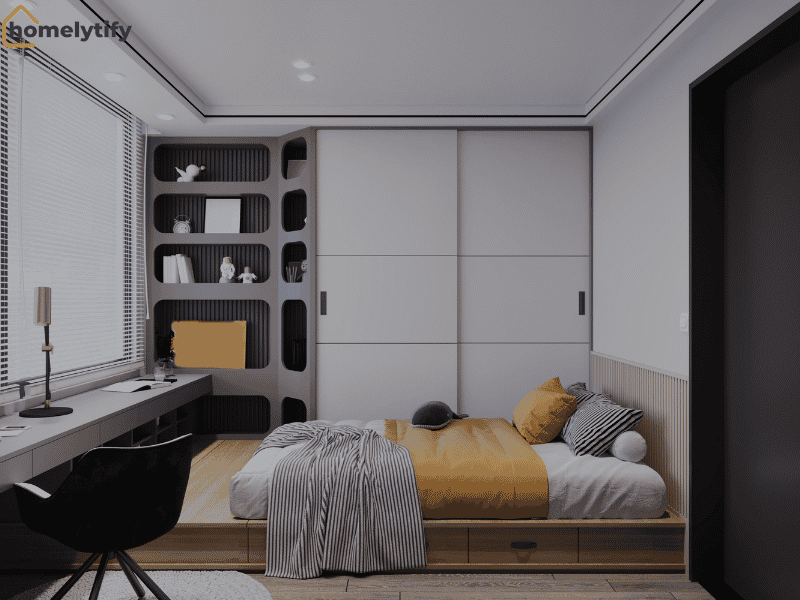 Modern bedroom with built-in shelves, under-bed drawers, and a sliding wardrobe showcasing practical bedroom storage tricks for small spaces.