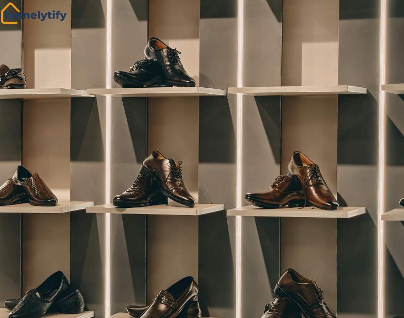 Hang a shoe organizer with multiple shelves neatly displaying brown leather dress shoes.