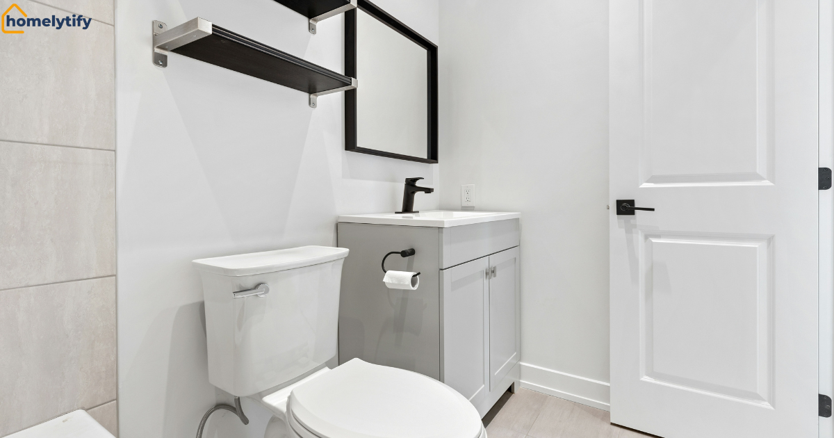 How to organize a bathroom with no cabinets using a floating shelf and vanity storage