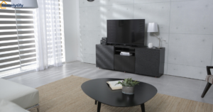 How to organize remotes and cables in a living room with a hidden storage TV console