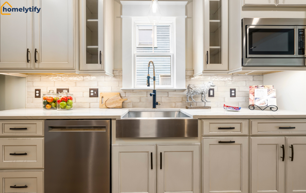 When kitchen cabinets feel overwhelming — cluttered farmhouse sink counter with jars, tools, and decor items